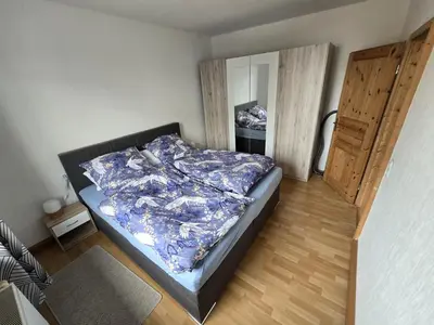 Ein Bett oder Betten in einem Zimmer der Unterkunft Haus Cronenberg im Harz