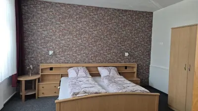 Ein Bett oder Betten in einem Zimmer der Unterkunft Steigerstube