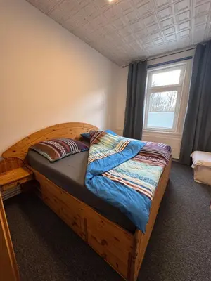 Ein Bett oder Betten in einem Zimmer der Unterkunft Steigerstube