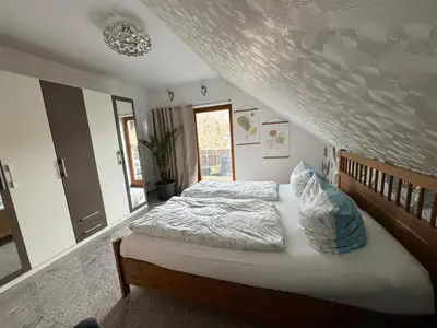 Ein Bett oder Betten in einem Zimmer der Unterkunft HarzMoment-Hasserode