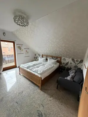 Ein Bett oder Betten in einem Zimmer der Unterkunft HarzMoment-Hasserode