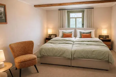 Ein Bett oder Betten in einem Zimmer der Unterkunft Ilsehus frisch saniertes Fachwerkhaus nahe Wernigerode Brocken im Harz