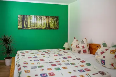 Ein Bett oder Betten in einem Zimmer der Unterkunft Ferienhaus Giesela ****