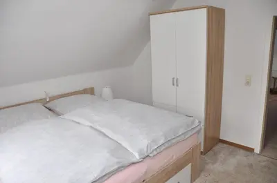 Ein Bett oder Betten in einem Zimmer der Unterkunft Ferienwohnung Martin 2