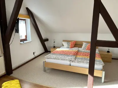 Ein Bett oder Betten in einem Zimmer der Unterkunft Alte Druckerei