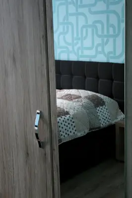 Ein Bett oder Betten in einem Zimmer der Unterkunft Apartments Altstadtoase