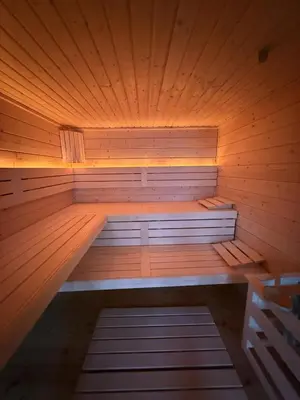 Ein Bett oder Betten in einem Zimmer der Unterkunft Bergflamme - Ihr Ferienhaus im Harz mit Sauna