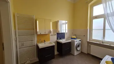 Ein Bett oder Betten in einem Zimmer der Unterkunft Ferienwohnung am Kaiserhof