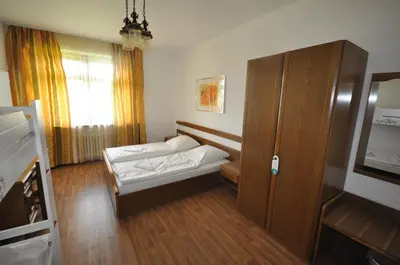 Ein Bett oder Betten in einem Zimmer der Unterkunft Hotel & Hostel Drei Bären