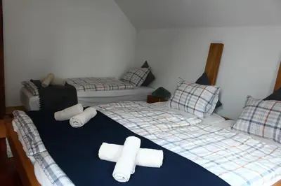 Ein Bett oder Betten in einem Zimmer der Unterkunft Ferienwohnung Teufelsmauer 