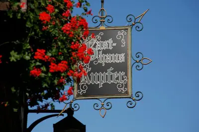 Ein Zertifikat, Auszeichnung, Logo oder anderes Dokument, das in der Unterkunft Gasthaus Kupfer ausgestellt ist
