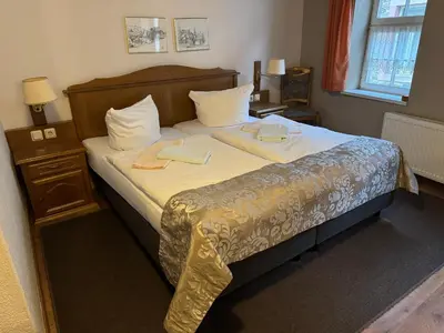 Ein Bett oder Betten in einem Zimmer der Unterkunft Gasthaus Kupfer