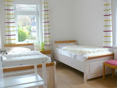 Ein Bett oder Betten in einem Zimmer der Unterkunft Ferienwohnung Siegers