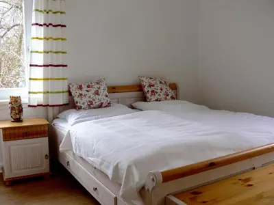 Ein Bett oder Betten in einem Zimmer der Unterkunft Ferienwohnung Siegers