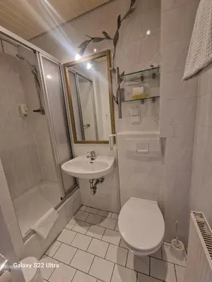 Ein Badezimmer in der Unterkunft Cafe Steffens