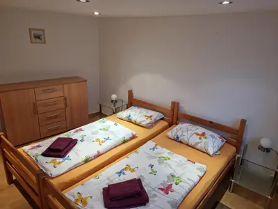 Ein Bett oder Betten in einem Zimmer der Unterkunft Ferienhaus Wernigerode 