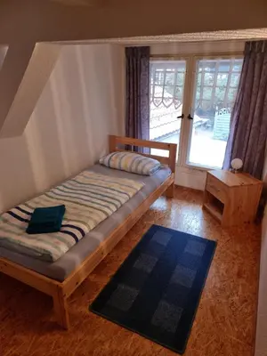 Ein Bett oder Betten in einem Zimmer der Unterkunft Ferienhaus Wernigerode 