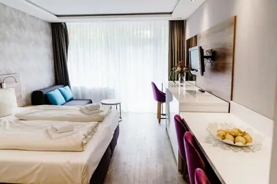 Ein Bett oder Betten in einem Zimmer der Unterkunft Appartements Am Kranichsee