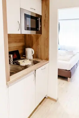 Ein Bett oder Betten in einem Zimmer der Unterkunft Appartements Am Kranichsee