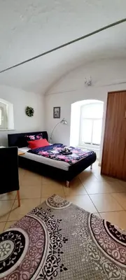 Ein Bett oder Betten in einem Zimmer der Unterkunft Schmiti FeWo