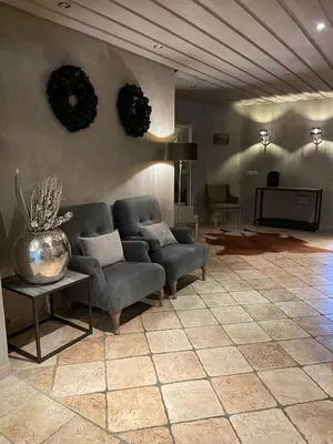 Ein Sitzbereich in der Unterkunft country-suites by verdino LIVING - Apartments & Privatzimmer