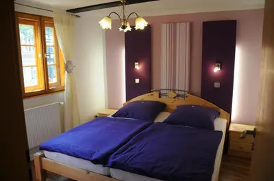 Ein Bett oder Betten in einem Zimmer der Unterkunft Ferienhaus am Oeringer Tor