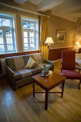 Ein Sitzbereich in der Unterkunft Klosterhotel Wöltingerode