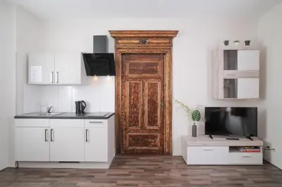 Küche/Küchenzeile in der Unterkunft Le petit Palais - Apartments