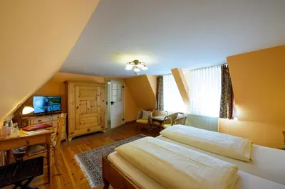 Ein Bett oder Betten in einem Zimmer der Unterkunft Hotel Theophano