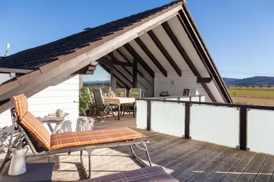 Ein Balkon oder eine Terrasse in der Unterkunft Exklusive Dachgeschosswohnung mit Harzblick