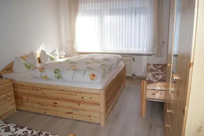 Ein Bett oder Betten in einem Zimmer der Unterkunft Ferienwohnung Schmidt