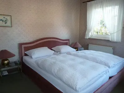 Ein Bett oder Betten in einem Zimmer der Unterkunft Haus Roswita