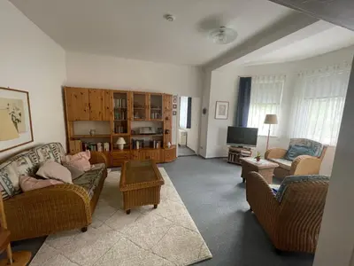 Ein Sitzbereich in der Unterkunft Ferienwohnung im Blauen Haus