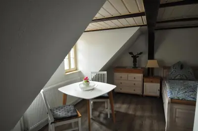 Ein Sitzbereich in der Unterkunft Gasthaus und Ferienwohnungen 