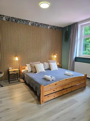 Ein Bett oder Betten in einem Zimmer der Unterkunft Hotel Zur Luppbode
