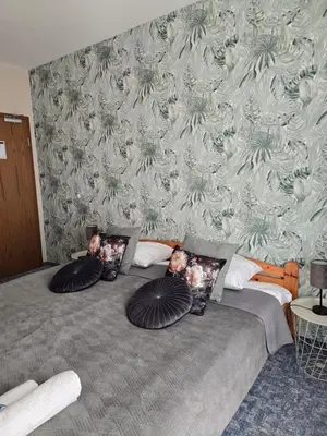 Ein Bett oder Betten in einem Zimmer der Unterkunft Hotel Zur Luppbode