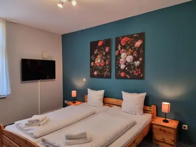 Ein Bett oder Betten in einem Zimmer der Unterkunft Hotel Zur Luppbode