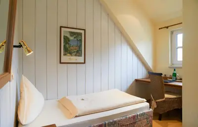 Ein Bett oder Betten in einem Zimmer der Unterkunft Hotel Zum Harzer