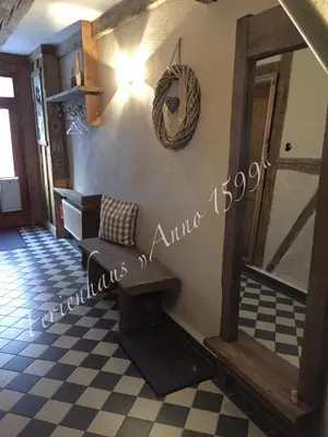 Ein Sitzbereich in der Unterkunft Ferienhaus Anno 1599