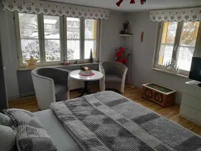 Ein Sitzbereich in der Unterkunft Haus Hubertus