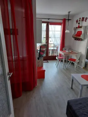 Ein Sitzbereich in der Unterkunft Ferienwohnung Sweety Haus Sachsensteinblick