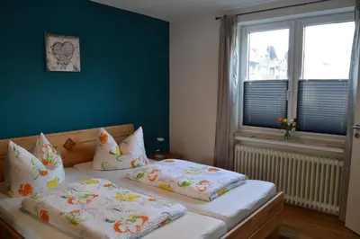 Ein Bett oder Betten in einem Zimmer der Unterkunft Haus Steeg