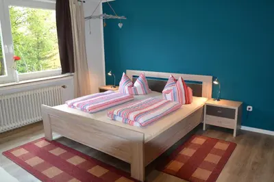 Ein Bett oder Betten in einem Zimmer der Unterkunft Haus Steeg