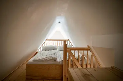 Ein Bett oder Betten in einem Zimmer der Unterkunft Ferienwohnungen Finkenherd 5