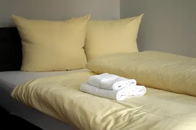 Ein Bett oder Betten in einem Zimmer der Unterkunft Apartments anno 1560