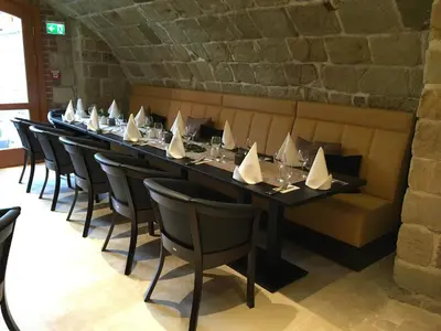 Ein Restaurant oder anderes Speiselokal in der Unterkunft Apartments anno 1560