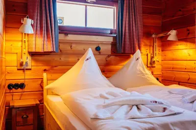 Ein Bett oder Betten in einem Zimmer der Unterkunft Blockhaus an der Skiwiese Braunlage