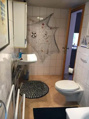 Ein Badezimmer in der Unterkunft Bungalow am Bach - zwischen Brocken und Schloß