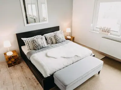 Ein Bett oder Betten in einem Zimmer der Unterkunft Hillside Braunlage