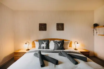 Ein Bett oder Betten in einem Zimmer der Unterkunft Kleiner Bergzauber